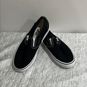 Vans Black and White Slip-On Sneakers